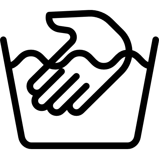 Pesumerkki: Käsinpesu. Ikoni esittää pesuallasta, jonka sisällä on käsi.